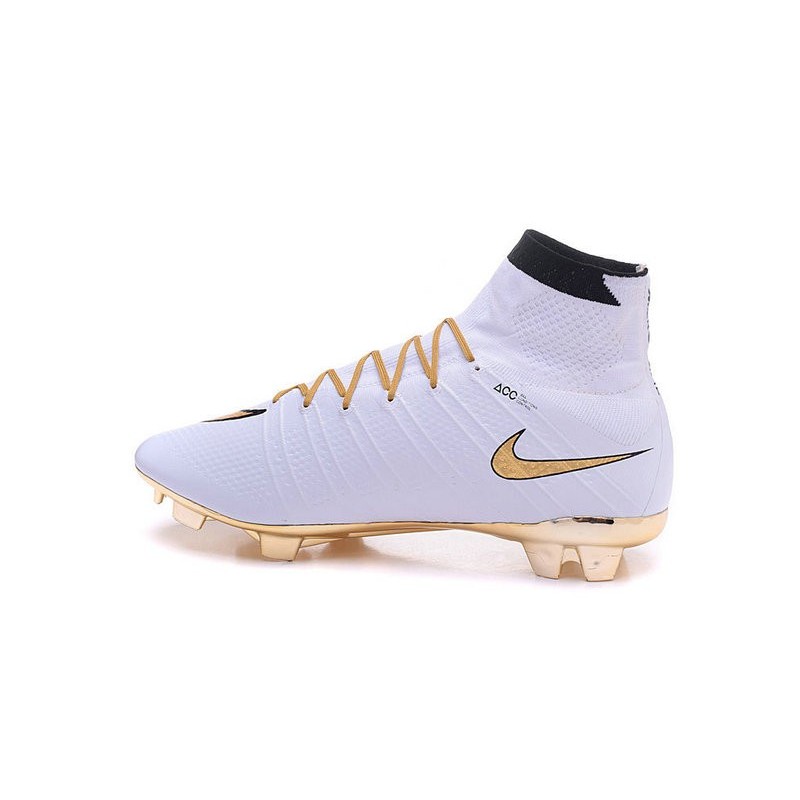 gold and white nike cleats