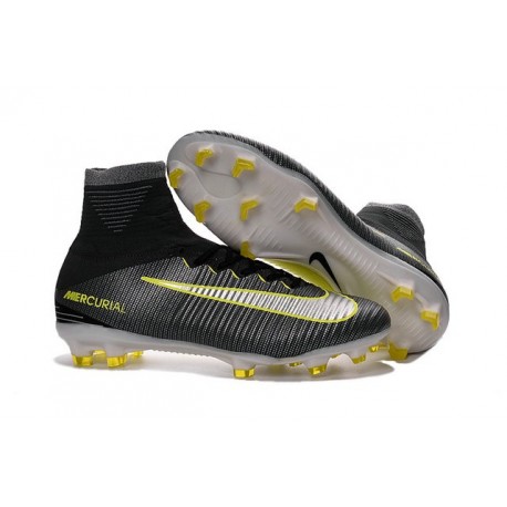 black and yellow nike cleats