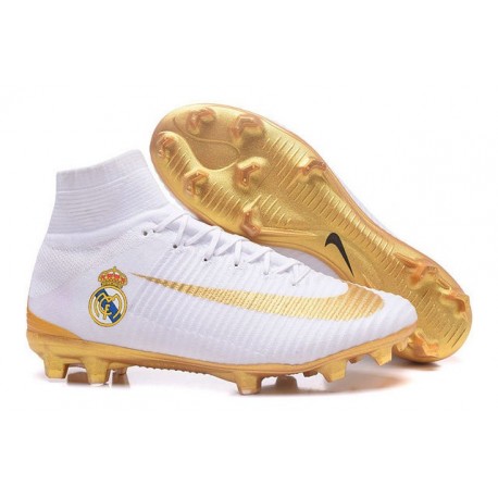 white and gold soccer boots