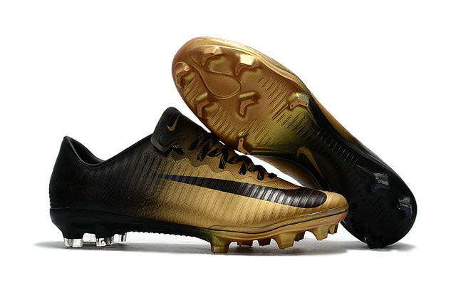 gold and black nike cleats