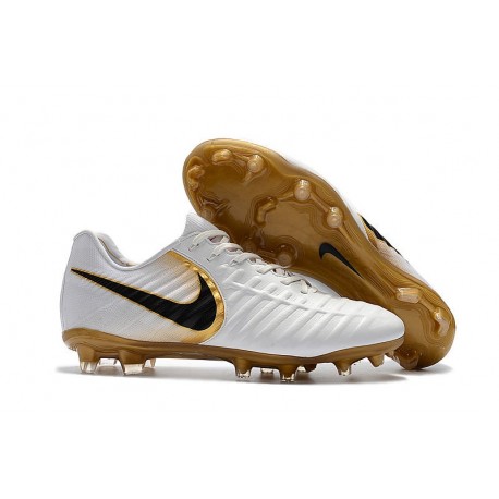 white and gold soccer cleats