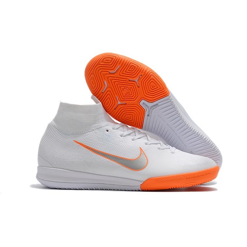 white orange nike shoes